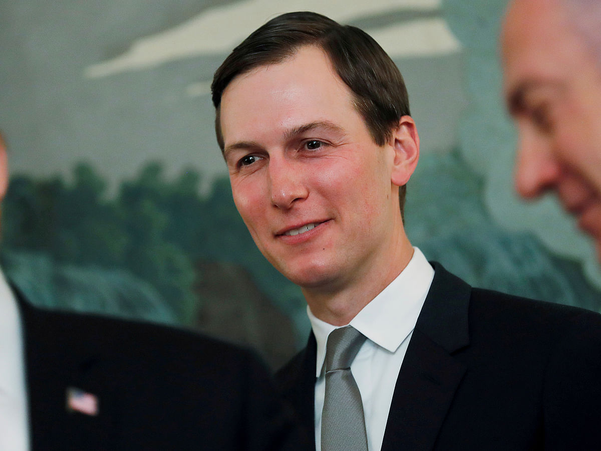 White House senior advisor Jared Kushner smiles while listening to US president Donald Trump talk as the president meets with Israel`s prime minister Benjamin Netanyahu at the White House in Washington, US on 25 March. Photo: Reuters