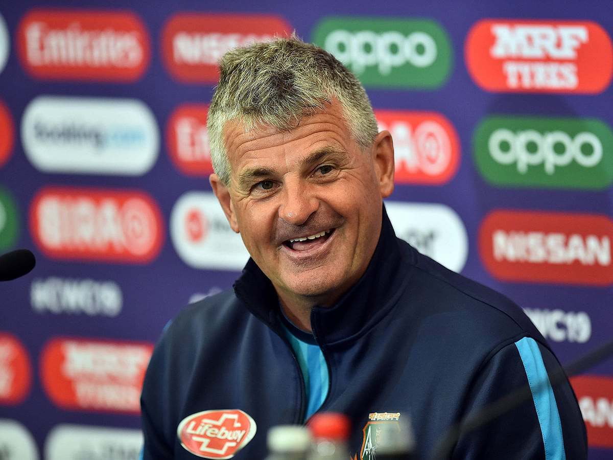 Bangladesh`s Head Coach Steve Rhodes gestures as he addresses media representatives at a press conference at the Rose Bowl in Southampton, southern England, on 23 June, 2019, ahead of their next match of the 2019 Cricket World Cup against Bangladesh. Photo: AFP