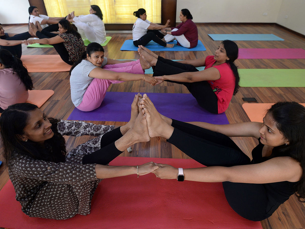 Nepali yoga practitioners take part in a yoga session class on International Yoga Day in Kathmandu on 21 June 2019. International Yoga Day is annually celebrated every year on 21 June. Photo: AFP