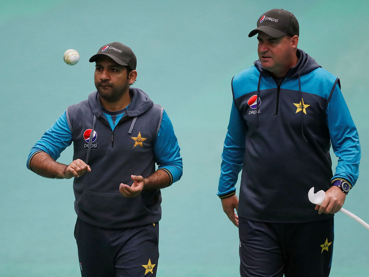 Pakistan coach Mickey Arthur and Sarfaraz Ahmed during nets in Old Trafford, Manchester, Britain on 15 June, 2019. Photo: Reuters