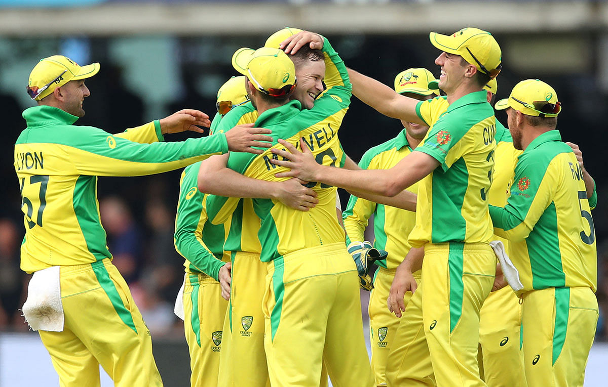 Australia`s Jason Behrendorff celebrates with teammates after taking the wicket of England`s Jofra Archer in the ICC Cricket World Cup match against England at Lord`s Cricket Ground, London, Britain on 25 June 2019. Photo: Reuters