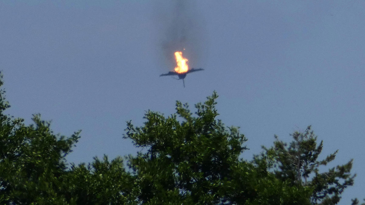 A burning aircraft of the type `Eurofighter` is seen in the sky above Malchow on 24 June 2019. Photo: AFP