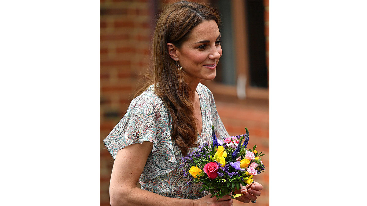 Britain`s Catherine, Duchess of Cambridge leaves after taking part in a photography workshop with Action for Children in Kingston, southwest London on 25 June 2019. Photo: AFP