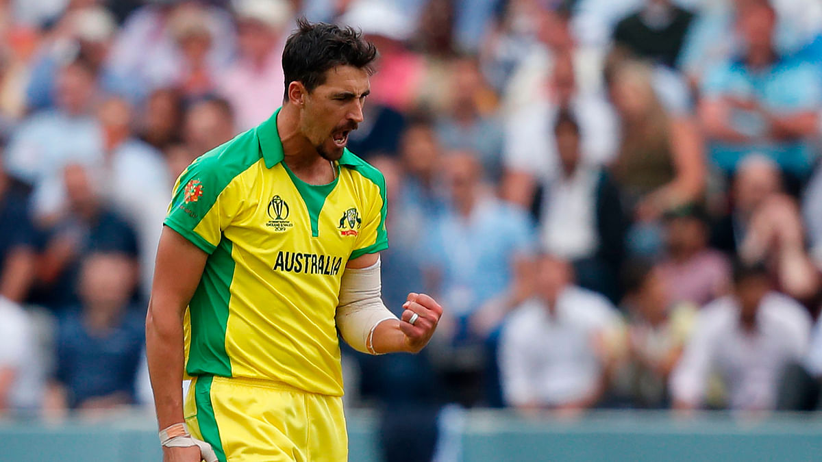 Australia`s Mitchell Starc celebrates after the dismissal of England`s Ben Stokes during the 2019 Cricket World Cup group stage match between England and Australia at Lord`s Cricket Ground in London on 25 June 2019. Photo: AFP
