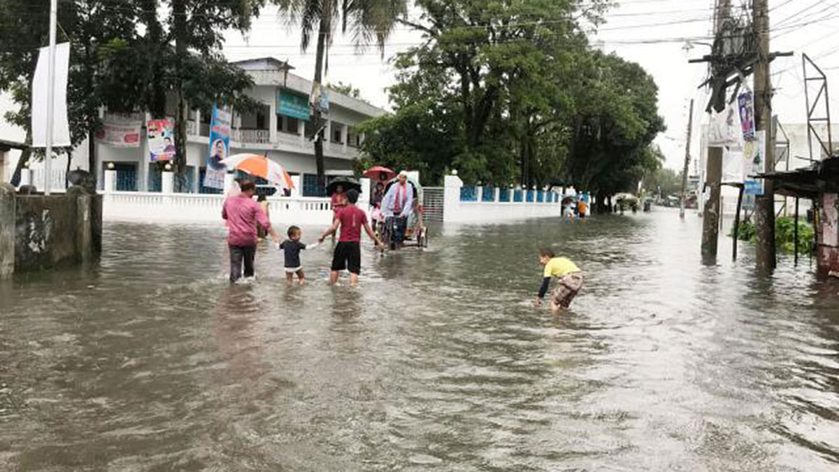 Inundation in Shilpakala Intersection, Sunamganj municipality on Friday morning. Photo: Khalil Rahman