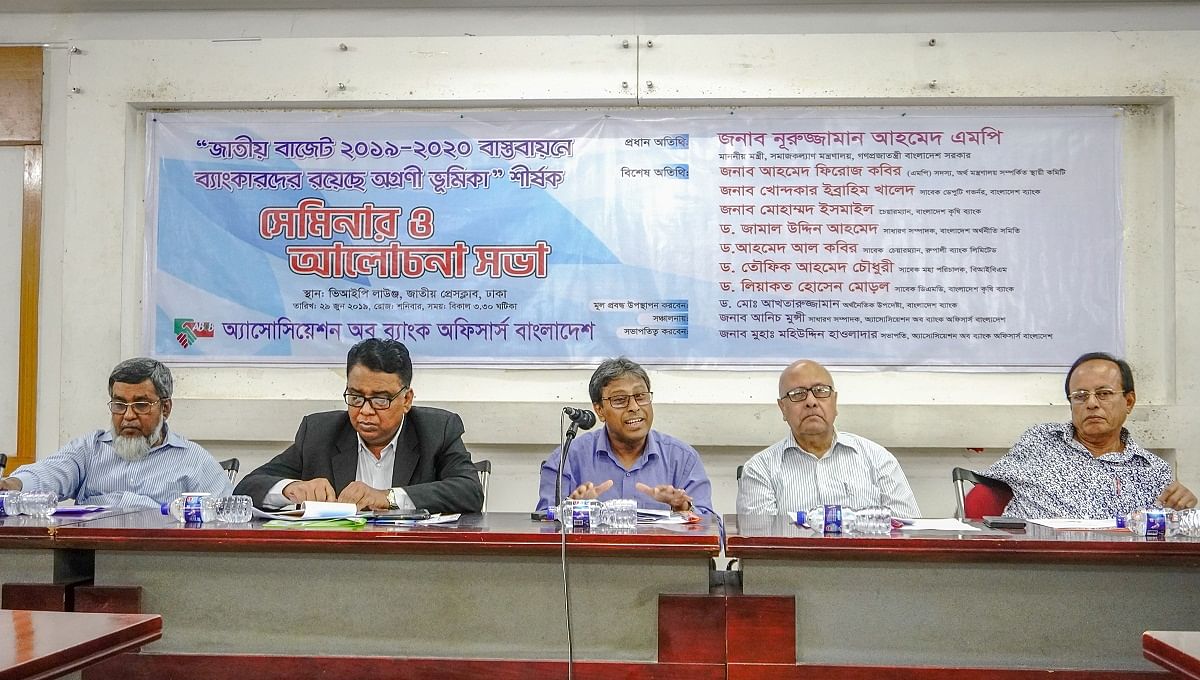 Executive director of Bangladesh Bank (research) Md Akhtaruzzaman presents the keynote paper at the programme at the National Press Club. Photo: UNB