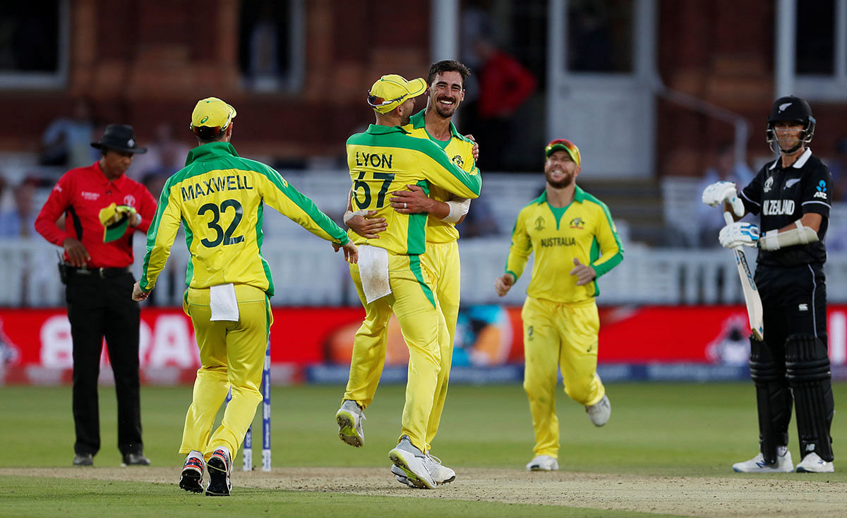 Australia`s Mitchell Starc celebrates winning the match by taking the wicket of New Zealand`s Mitchell Santner in the ICC Cricket World Cup match against New Zealand at Lord`s, London, Britain on 29 June 2019. Photo: Reuters