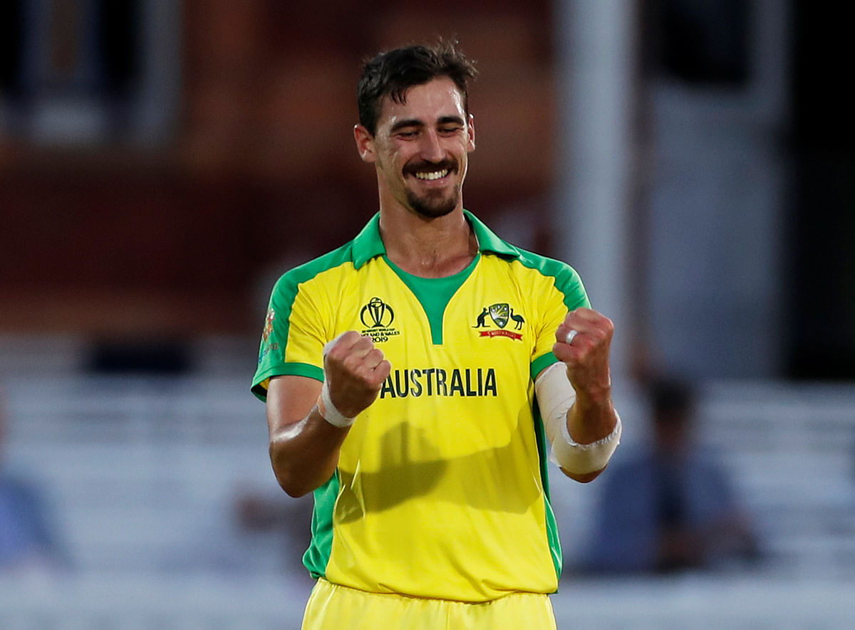 Australia`s Mitchell Starc celebrates winning the match by taking the wicket of New Zealand`s Mitchell Santner in the ICC Cricket World Cup match against New Zealand at Lord`s, London, Britain on 29 June 2019. Photo: Reuters