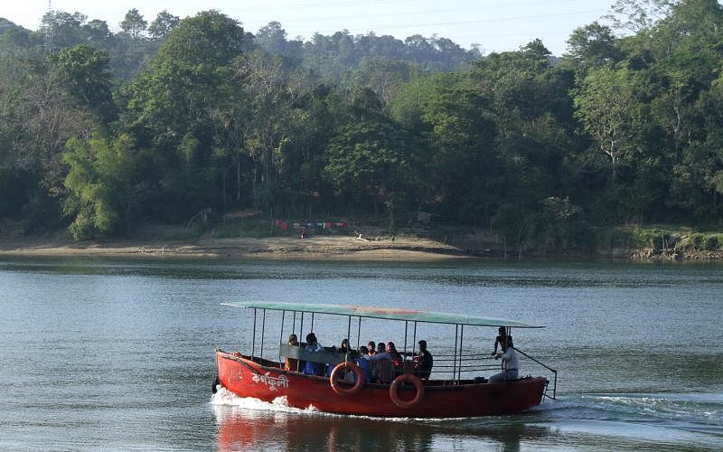 Tourists go for boating in Karnafuli River in Kaptai of Rangamati on 20 March. Photo: Supriya Chakma