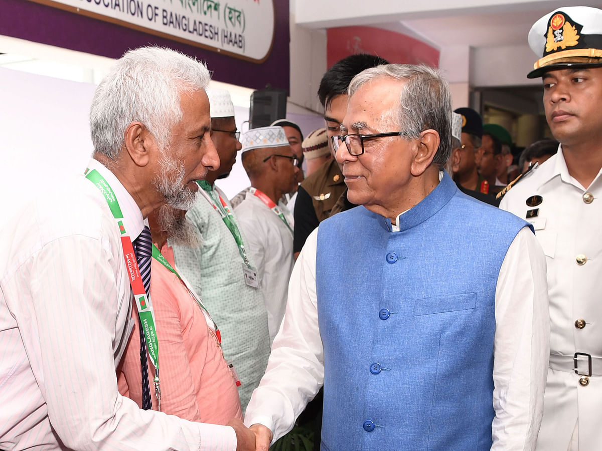 President Abdul Hamid meets a pilgrim at the inaugural ceremony of the Hajj programme-2019 at the Hajj Camp in Dhaka`s Ashkona on Tuesday. Photo: PID