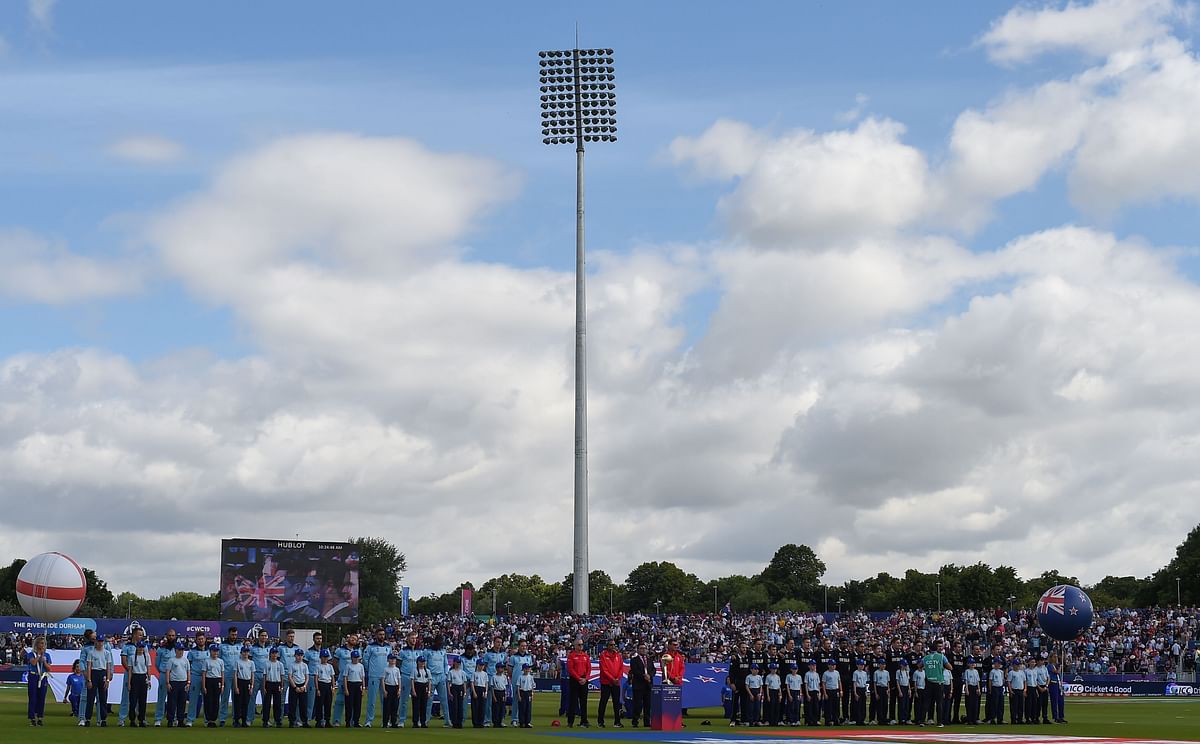England (L) and New Zealand players line up for the national anthems ahead of the start of the 2019 Cricket World Cup group stage match between England and New Zealand at the Riverside Ground, in Chester-le-Street, northeast England, on 3 July 2019. Photo: AFP