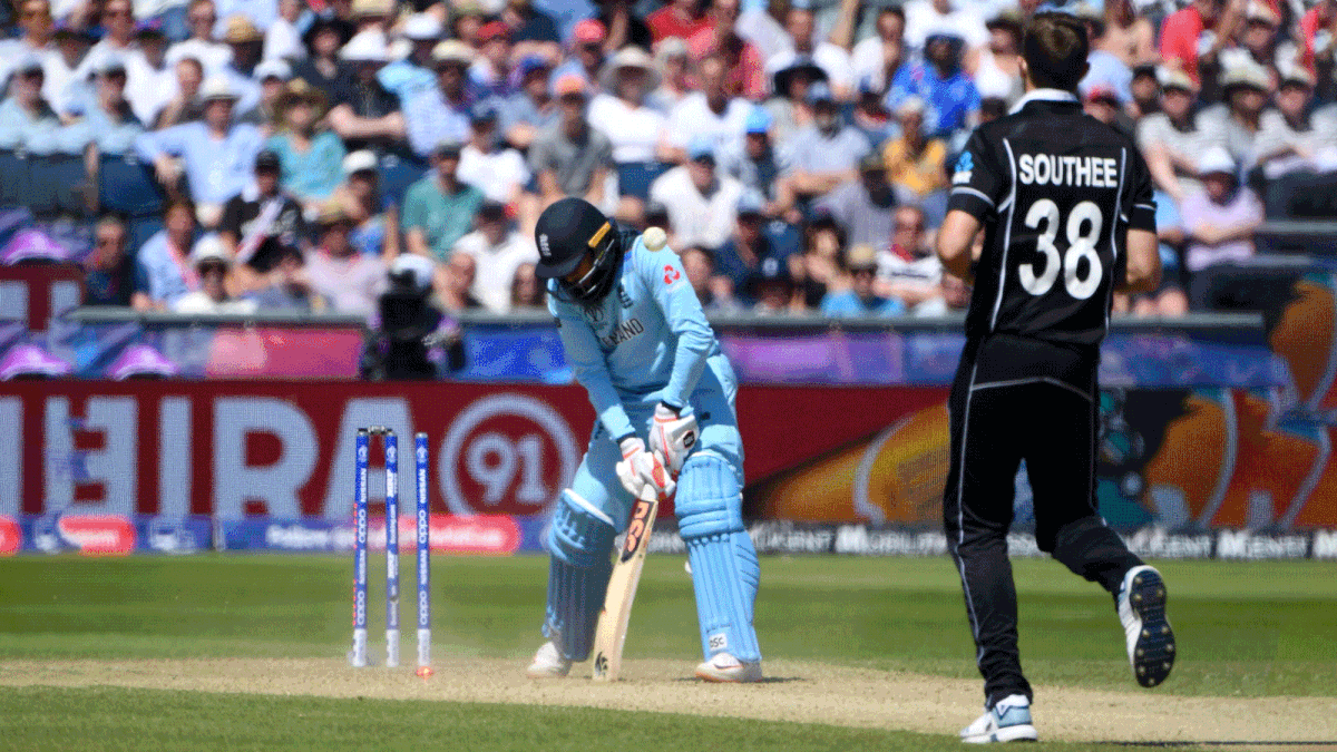 England`s Adil Rashid (L) is bowled by New Zealand`s Tim Southee (R) during the 2019 Cricket World Cup group stage match between England and New Zealand at the Riverside Ground, in Chester-le-Street, northeast England, on 3 July 2019. Photo: AFP
