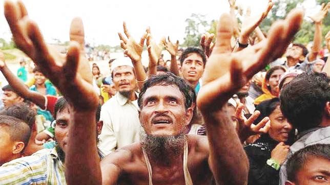 Rohingya men waiting for relief. File Photo