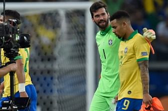 Brazil`s goalkeeper Alisson and Brazil`s Gabriel Jesus celebrate after defeating Argentina during their Copa America football tournament semi-final match at the Mineirao Stadium in Belo Horizonte, Brazil, on 2 July 2019. Photo: AFP
