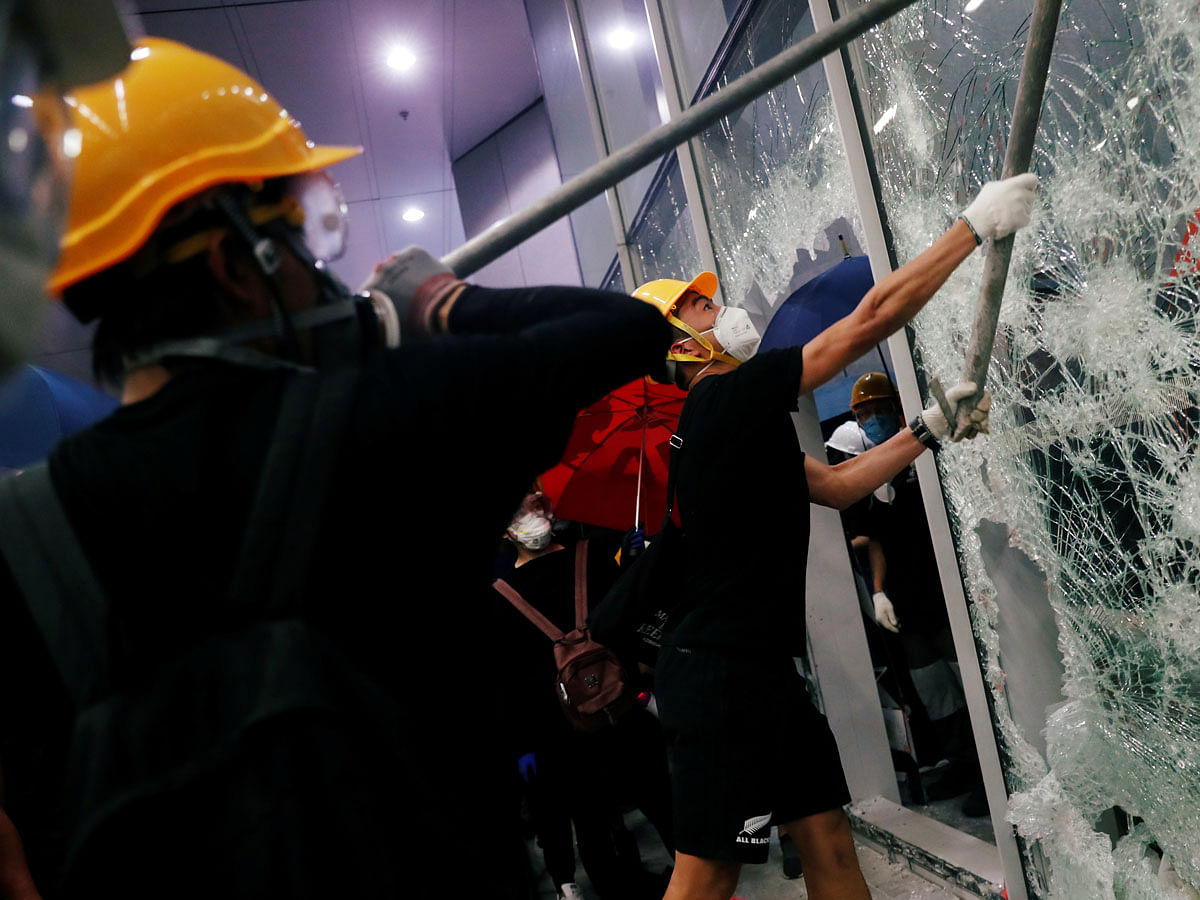 Protesters break into the Legislative Council building during the anniversary of Hong Kong`s handover to China in Hong Kong, China on 1 July. Photo: Reuters