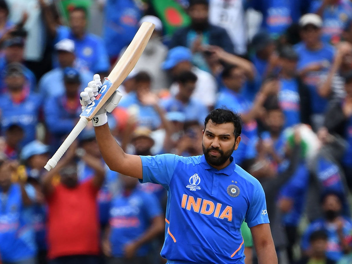 India`s Rohit Sharma celebrates making his century during the 2019 Cricket World Cup group stage match between Bangladesh and India at Edgbaston in Birmingham, central England, on 2 July 2019. Photo : AFP