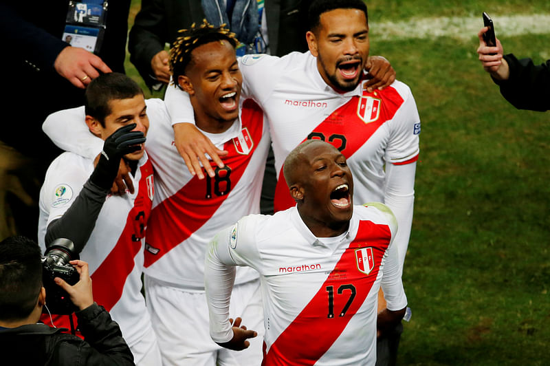 Peru`s Luis Advincula celebrates with team mates after the Copa America Brazil 2019 Semi-final match against Chile at Arena do Gremio, Porto Alegre, Brazil on 3 July 2019. Photo: Reuters