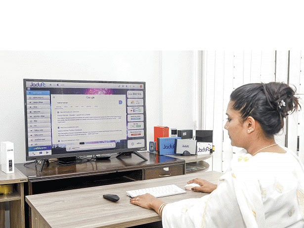 A Bangladeshi information technologist has invented a small device that can turn one’s TV into a personal computer. Photo: Khaled Sarkar