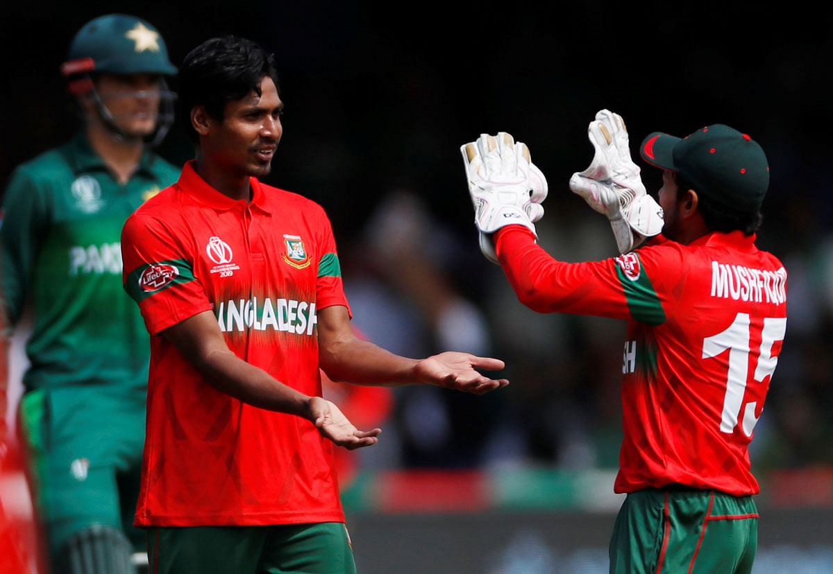 Bangladesh`s Mustafizur Rahman celebrates taking the wicket of Pakistan`s Mohammad Amir. Photo: Reuters