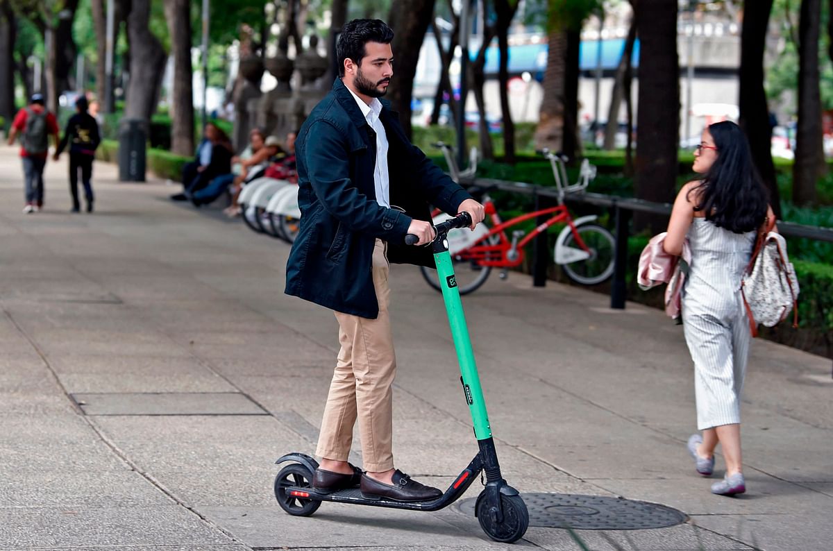 A man rides a rented electric scooter at Juarez neighbourhood in Mexico City on 2 July 2019. Photo: AFP  How eco-friendly are electric scooters?