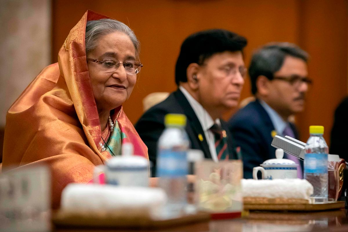 Bangladesh`s prime minister Sheikh Hasina (L) sits during a meeting with Chinese president Xi Jinping at the Diaoyutai State Guesthouse in Beijing on 5 July 2019. Photo: AFP
