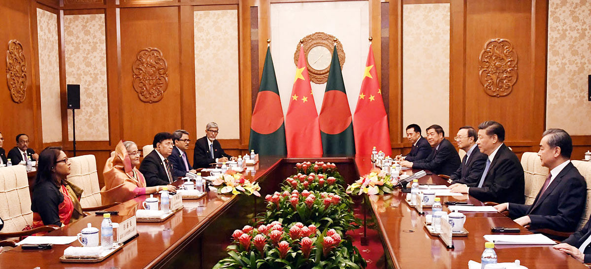 Prime minister Sheikh Hasina (2nd L) led the Bangladesh delegation in talks with China president Xi Jinping (2nd R) at Diaoyuati State Guest House in Beijing, China on Friday. Photo: PID