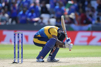 Sri Lanka`s Angelo Mathews ducks under a short ball during the 2019 Cricket World Cup group stage match between Sri Lanka and India at Headingley in Leeds, northern England, on 6 July 2019. Photo: AFP