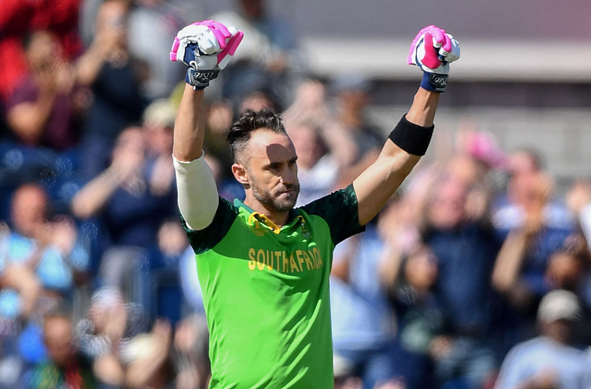 South Africa`s captain Faf du Plessis celebrates after scoring a century (100 runs) during the 2019 Cricket World Cup group stage match between Australia and South Africa at Old Trafford in Manchester, northwest England, on 6 July, 2019. Photo: AFP