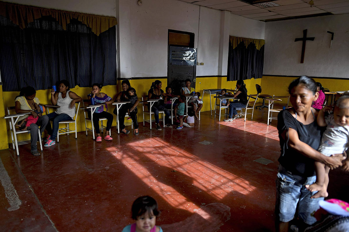 Yukpa indigenous children wait for their turn to be checked by a doctor of the CARITAS organisation, at Los Angeles del Tukuko mission, near Machiques, Zulia state, Venezuela on 12 June 2019. Photo: AFP