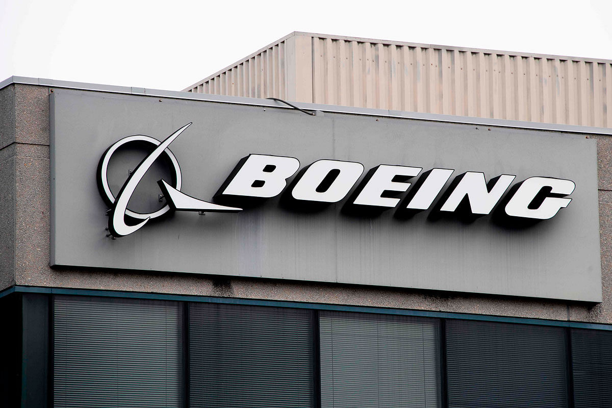 In this file photo taken on 11 March 2019 The Boeing Company logo is seen on a building in Annapolis Junction, Maryland. Boeing announced 3 July 2019 it would give $100 million to communities and families affected by two crashes on its 737 MAX planes that claimed 346 lives. Photo: AFP
