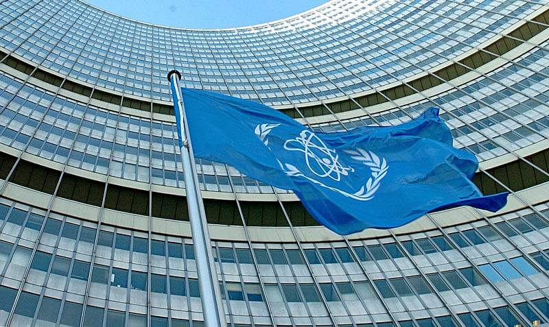 In this file photo taken on 15 November 2004 the IAEA flag flatters in the wind in front of the International Atomic Energy Agency headquarters in UN city in Vienna. The UN`s nuclear watchdog confirmed on 8 July 2019 that Iran has enriched uranium at a level higher than the limit set in a 2015 international pact. AFP File Photo