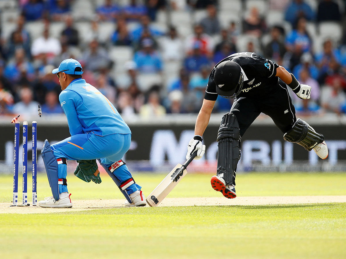 New Zealand`s Ross Taylor is run out in the ICC Cricket World Cup Semi-final against India at Old Trafford, Manchester, Britain on 10 July 2019. Photo: Reuters