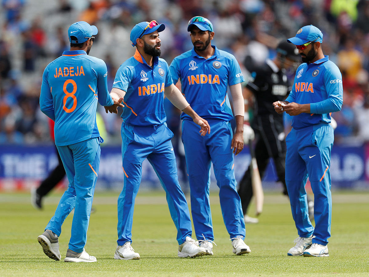 India`s Virat Kohli and team mates after New Zealand`s innings in the ICC Cricket World Cup Semi-final at Old Trafford, Manchester, Britain on 10 July 2019. Photo: Reuters