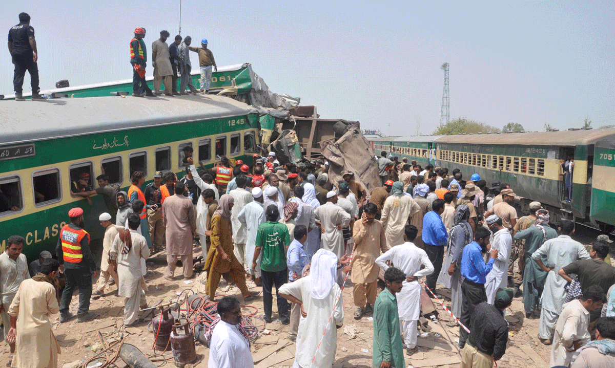Pakistan train collision kills 11, injures 78Residents and rescue workers gather near the site after a passenger train collided with a cargo train in Sadiqabad, Pakistan 11 July, 2019. Photo: AFP