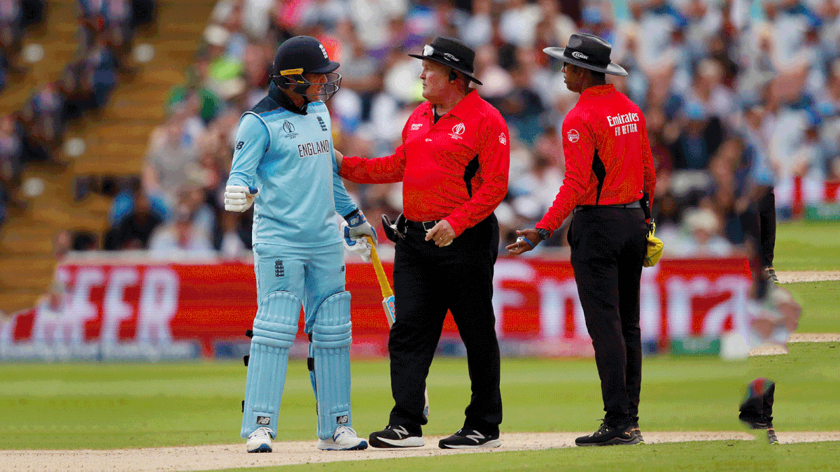 England`s Jason Roy speaks with umpire Handunnettige Dharmasena and Marais Erasmus during Australia-England match in Edgbaston, Birmingham, Britain on 11 July, 2019. Photo: AFP
