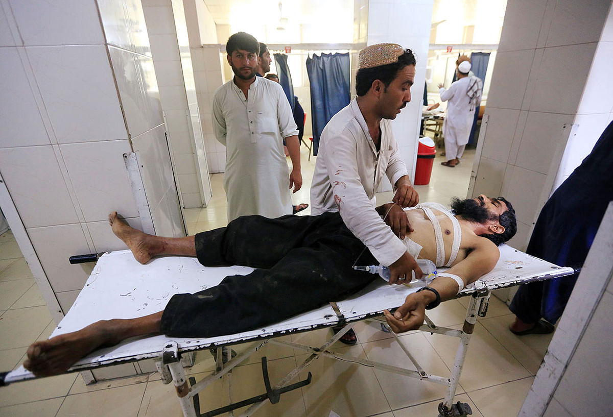 An injured man receives treatment at the hospital, after a suicide attack in Jalalabad, Afghanistan on 12 July, 2019. Photo: Reuters