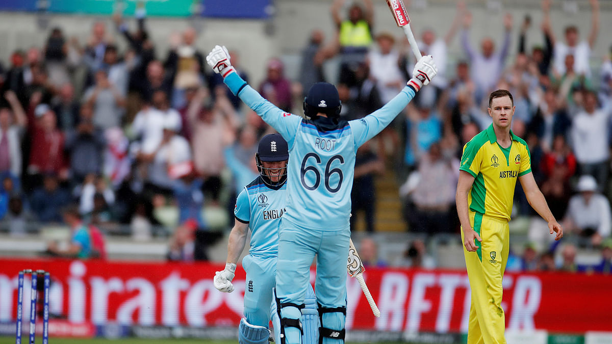 England`s Eoin Morgan and Joe Root celebrate after the semi final match against Australia at Edgbaston, Birmingham, Britain on 11 July, 2019. Photo: Reuters