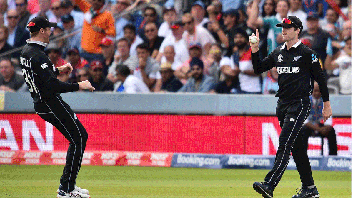 New Zealand`s Lockie Ferguson (R) celebrates after catching the ball to take the wicket of England`s captain Eoin Morgan for nine runs during the 2019 Cricket World Cup final between England and New Zealand at Lord`s Cricket Ground in London on July 14, 2019. AFP