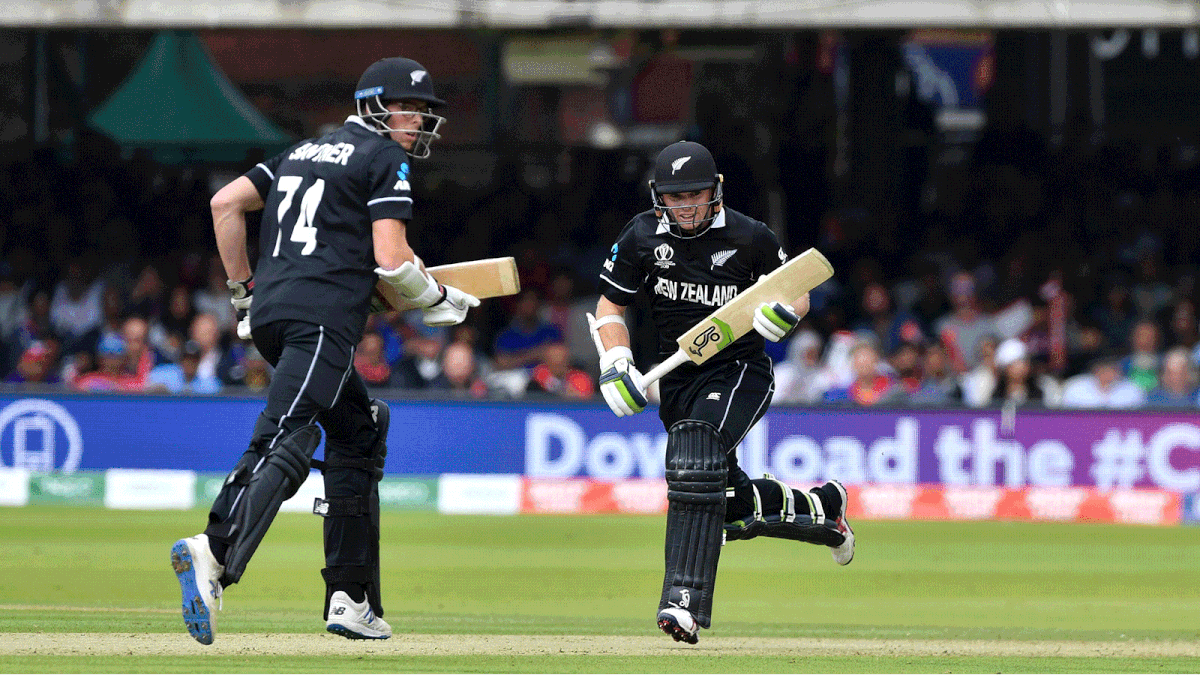 New Zealand`s Mitchell Santner (L) and New Zealand`s Tom Latham add runs during the 2019 Cricket World Cup final between England and New Zealand at Lord`s Cricket Ground in London on 14 July 2019. Photo: AFP