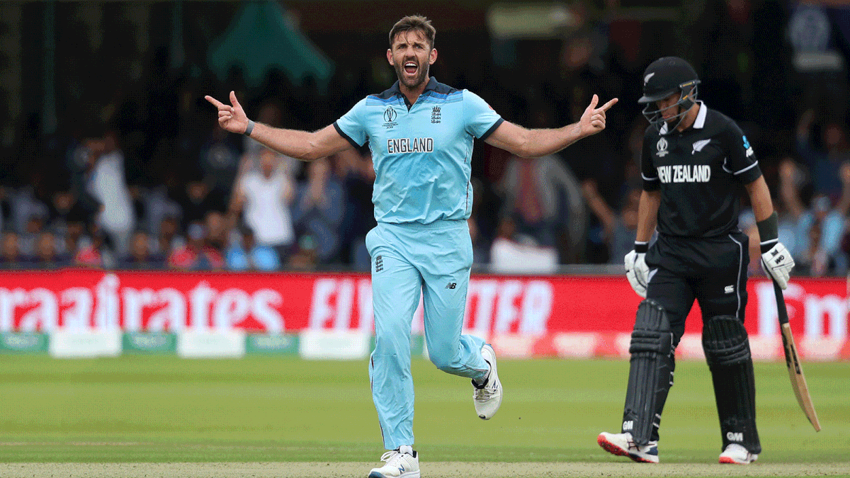 England`s Liam Plunkett celebrates taking the wicket of New Zealand`s Henry Nicholls. Photo: Reuters