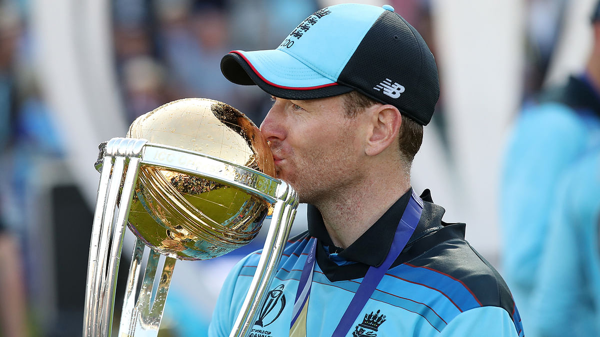 England`s Eoin Morgan celebrates winning the world cup with the trophy at Lord`s in London, Britain on 14 July, 2019. Photo: Reuters