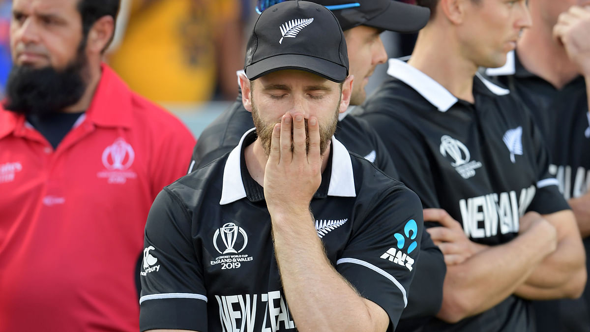 New Zealand`s captain Kane Williamson reacts on the pitch after the 2019 Cricket World Cup final between England and New Zealand at Lord`s Cricket Ground in London on 14 July, 2019. Photo: AFP