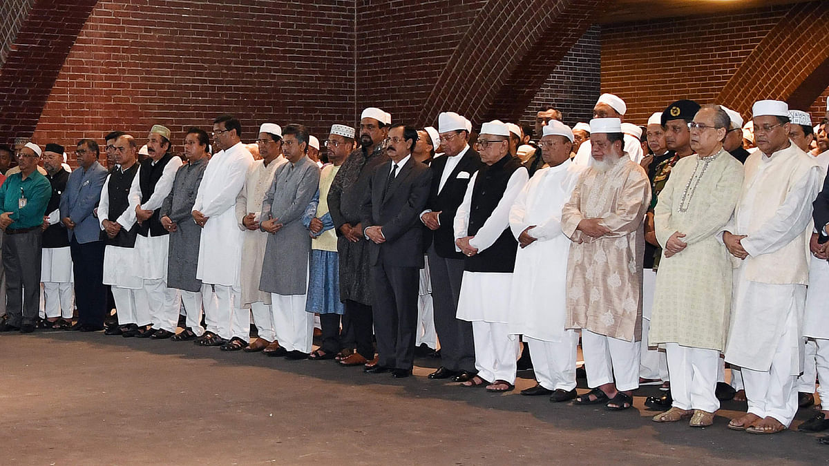 Members of parliament offer prayers during the funeral of former president Hussain Muhammad Ershad in Dhaka on 15 July, 2019. Photo: AFP
