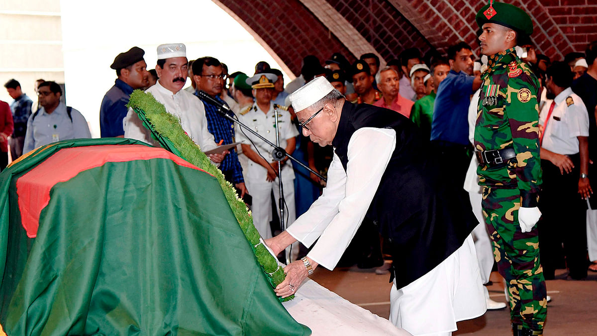 President Mohammad Abdul Hamid (C) pays his respect during a funeral of former president Hussain Muhammad Ershad in Dhaka on 15 July, 2019. Photo: AFP