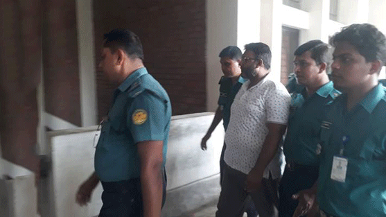 Police take former officer-in-charge of Feni’s Sonagazi police station Moazzem Hossain to the Bangladesh Cyber Tribunal on Wednesday. Photo: Asaduzzaman