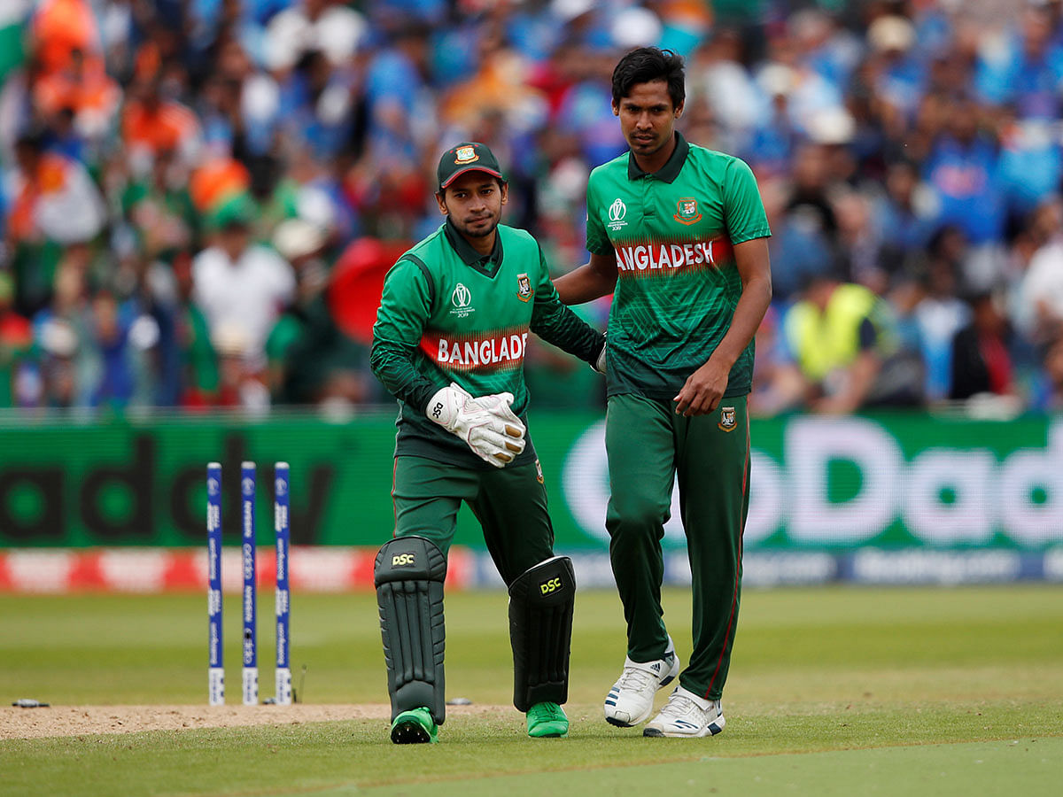 Bangladesh`s Mustafizur Rahman celebrates with Mushfiqur Rahim after taking the wicket of India`s Mohammed Shami in the ICC Cricket World Cup match at Edgbaston, Birmingham, Britain on 2 July 2019. Reuters File Reuters