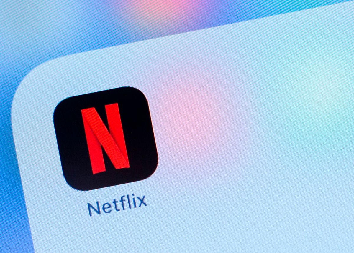 In this file photo taken on 10 July 2019, the Netflix logo is seen on a phone in this photo illustration in Washington, DC. Photo: AFP