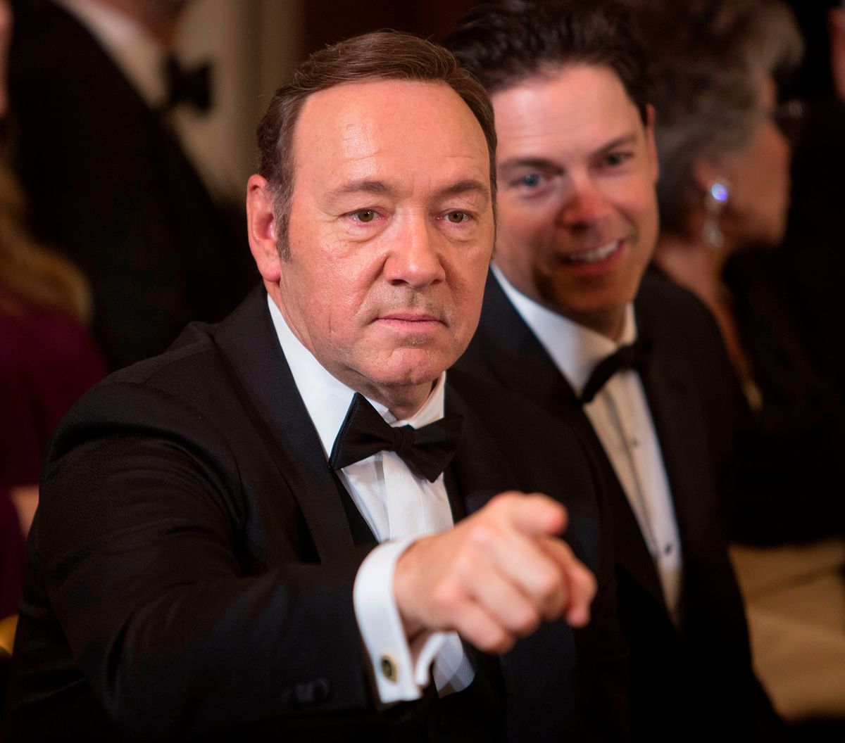 In this file photo taken on 4 December 2016, actor Kevin Spacey acknowledges another guest during a reception for the 2016 Kennedy Center Honorees at the White House in Washington, DC. Photo: AFP