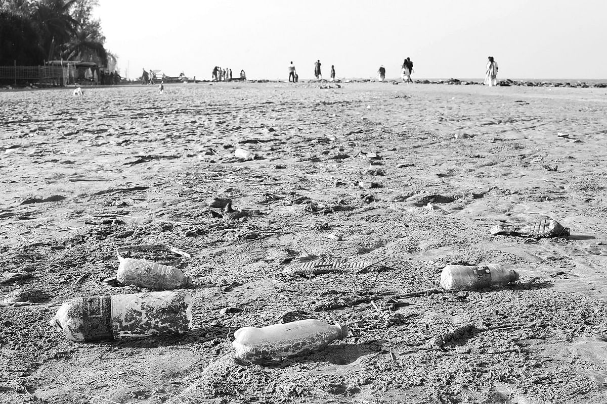 Plastic bottles strewn all over Saint Martin`s Island. Photo: Prothom Alo