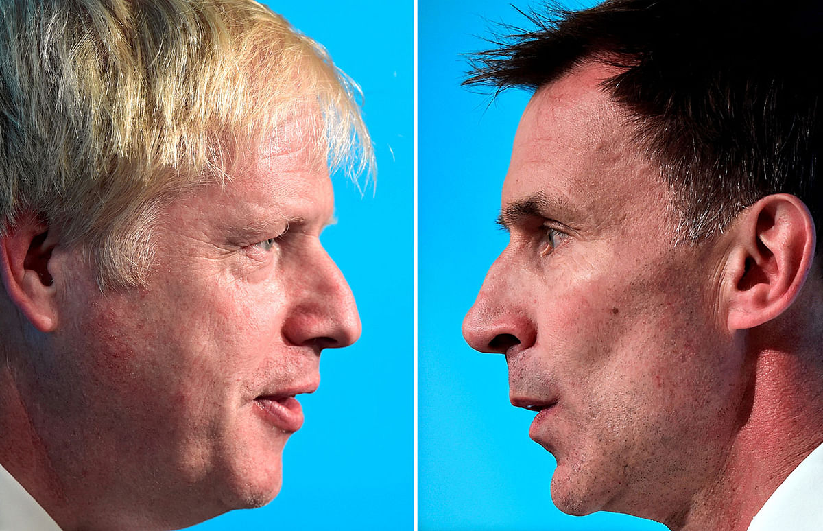 A combination pictures shows Boris Johnson and Jeremy Hunt, leadership candidates for Britain`s Conservative Party, attending a hustings event in Cardiff, Wales, Britain on 6 July. Photo: Reuters